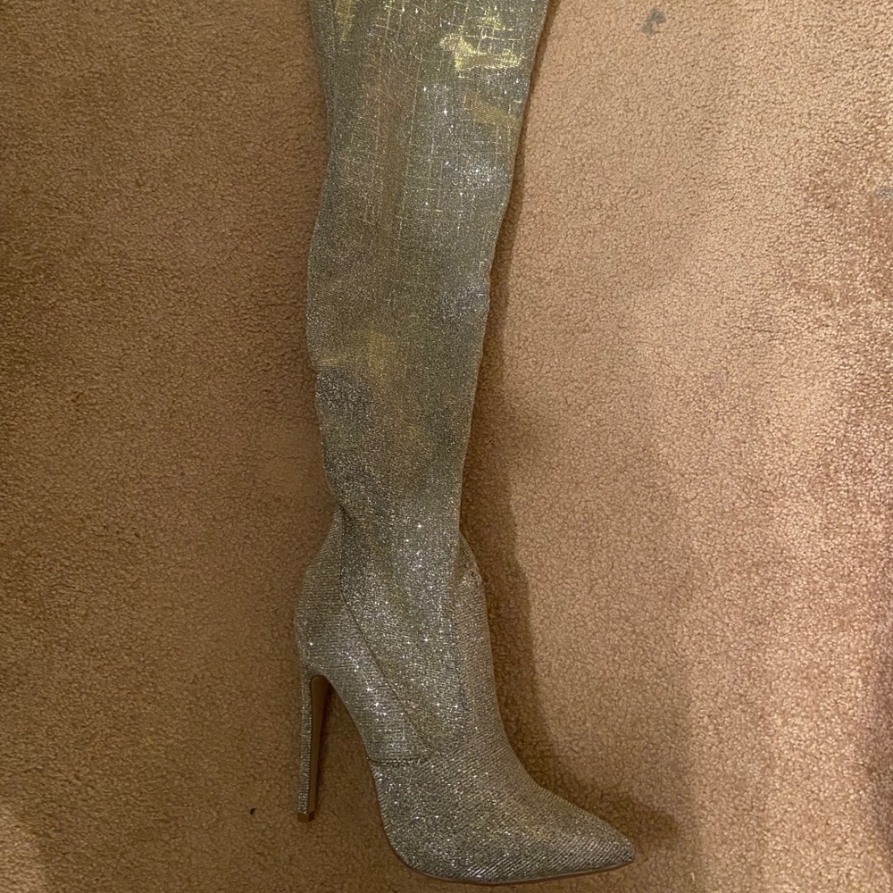 Thigh high glittery boots
